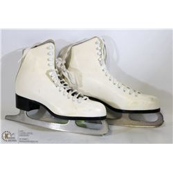 PAIR OF WHITE CCM FIGURE SKATES IN TOP
