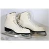 Image 1 : PAIR OF WHITE CCM FIGURE SKATES IN TOP