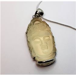 19)  CREAM COLORED ROCK CRYSTAL