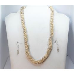 14)  VINTAGE CREAM COLORED TWISTED 21"