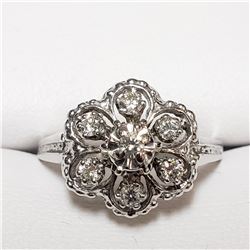 21) 18KT WHITE GOLD DIAMOND RING. SIZE 10