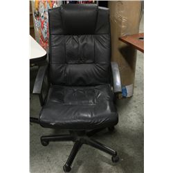 BLACK OFFICE CHAIR SHOWS SIGNS OF USE
