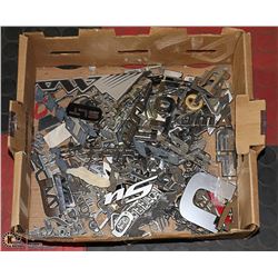 BOX FULL OF VEHICLE EMBLEMS AND