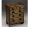 Image 1 : A Victorian Walnut Miniature Chest of Drawers 