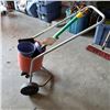 Image 1 : Seed spreader and garden supplies