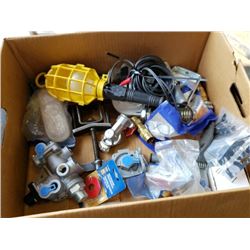 Box of new semi truck parts and trouble light