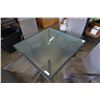 Image 2 : SQUARE GLASSTOP PATIO TABLE AND 4 SWIVEL CHAIRS