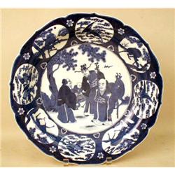 A BLUE AND WHITE GLAZED CHARGER