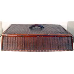 A LARGE BROWN STAINED BAMBOO AND CANE F