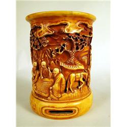 A CONTEMPORARY CARVED BONE BRUSH POT