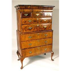 A GEORGE I FIGURED WALNUT HIGH CHEST OF