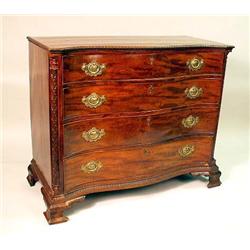 A GEORGE II CARVED AND FIGURED MAHOGANY