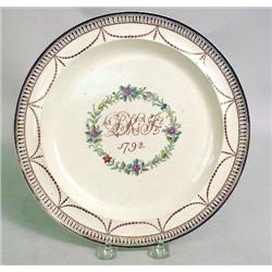 A POLYCHROME DECORATED SOFT PASTE PORCE