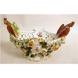 A POLYCHROME DECORATED FLORAL AND PARRO