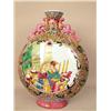 Image 1 : A POLYCHROME FLORAL AND FIGURE DECORATE
