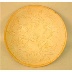 A FLORAL AND FISH DECORATED BISQUE GLAZ