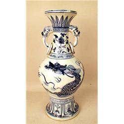 A MING STYLE BLUE AND WHITE GLAZED DRAG