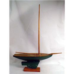 A GREEN PAINTED PINE SHIP MODEL