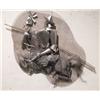 Image 1 : A TIN AND MESH WALL SCULPTURE