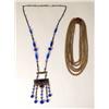 Image 1 : A BLUE CRYSTAL AND GOLD NECKLACE