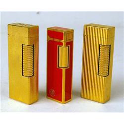 A TIFFANY & CO. RED ENAMEL POCKET LIGHT