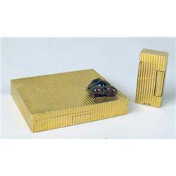 A 14K YELLOW GOLD RIBBED FORM CIGARETTE