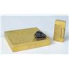 Image 1 : A 14K YELLOW GOLD RIBBED FORM CIGARETTE