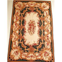 AN AUBUSSON STYLE NEEDLEPOINT RUG