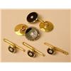 Image 2 : A PAIR OF YELLOW GOLD AND GARNET CUFFLI