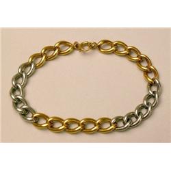 A 14K YELLOW GOLD AND PLATINUM CURB LIN