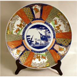 A LARGE PORCELAIN CHARGER