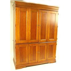 A STAINED WOOD ARMOIRE STYLE ENTERTAINM