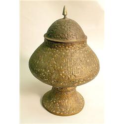 A MOORISH BRASS REPOUSSE COVERED JAR