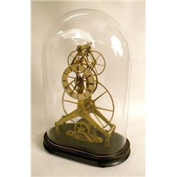 A CAST BRASS SKELETON CLOCK