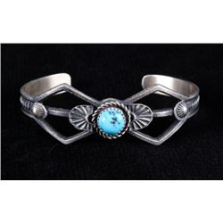 Navajo Silver Sand Cast Kingman Turquoise Bracelet