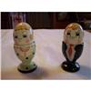 Image 1 : Pair of Egg Cups with Salt and Pepper #1174740