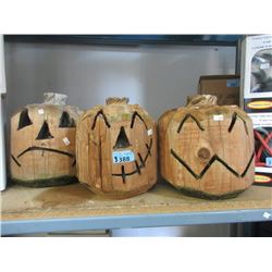 3 Pumpkins Carved From Tree Stumps