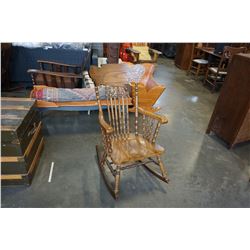 OAK CARVED PRESS BACK ROCKING CHAIR