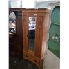 Image 2 : ANTIQUE OAK CARVED AND BEADED WARDROBE W/ ORIGINAL BEVELED GLASS AND KEY