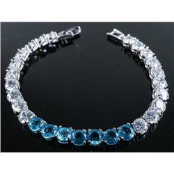 .925 Silver Blue Topaz and White Swarovski Element Bracelet.