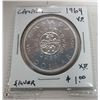 Image 1 : 1964 CANADIAN SILVER DOLLAR COIN.
