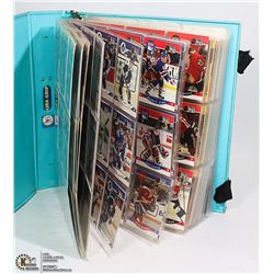 BINDER OF ASSORTED HOCKEY CARDS