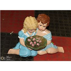PAIR OF GIRLS CERAMIC STATUE
