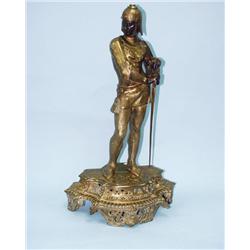 A good antique finely cast gold patinat