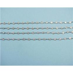 A Belle Epoque style 32" long platinum 