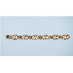 An exquisitely handmade 18 kt. yellow g