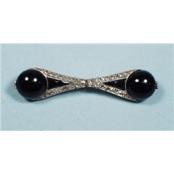 ART DECO - An 18 kt. gold, platinum and