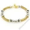 Image 1 : 14kt Yellow Gold Twisted Tube and 14kt White Gold Rolo Link Chain Toggle Bracele