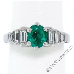 14kt White Gold 1.33 ctw Emerald Solitaire and Baguette Diamond Step Ring
