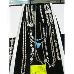 A LOT OF SILVER COLOR NECKLACES AND BRACELETS